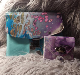 mit kleiner Geldbörse